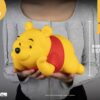 Winnie The Pooh Small Vinyl Bank laid-back Winnie 17 cm